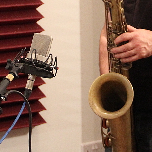 Neumann TLM on saxophone.